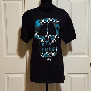 Vintage Stussy Black Tee with Blue Floral Skull